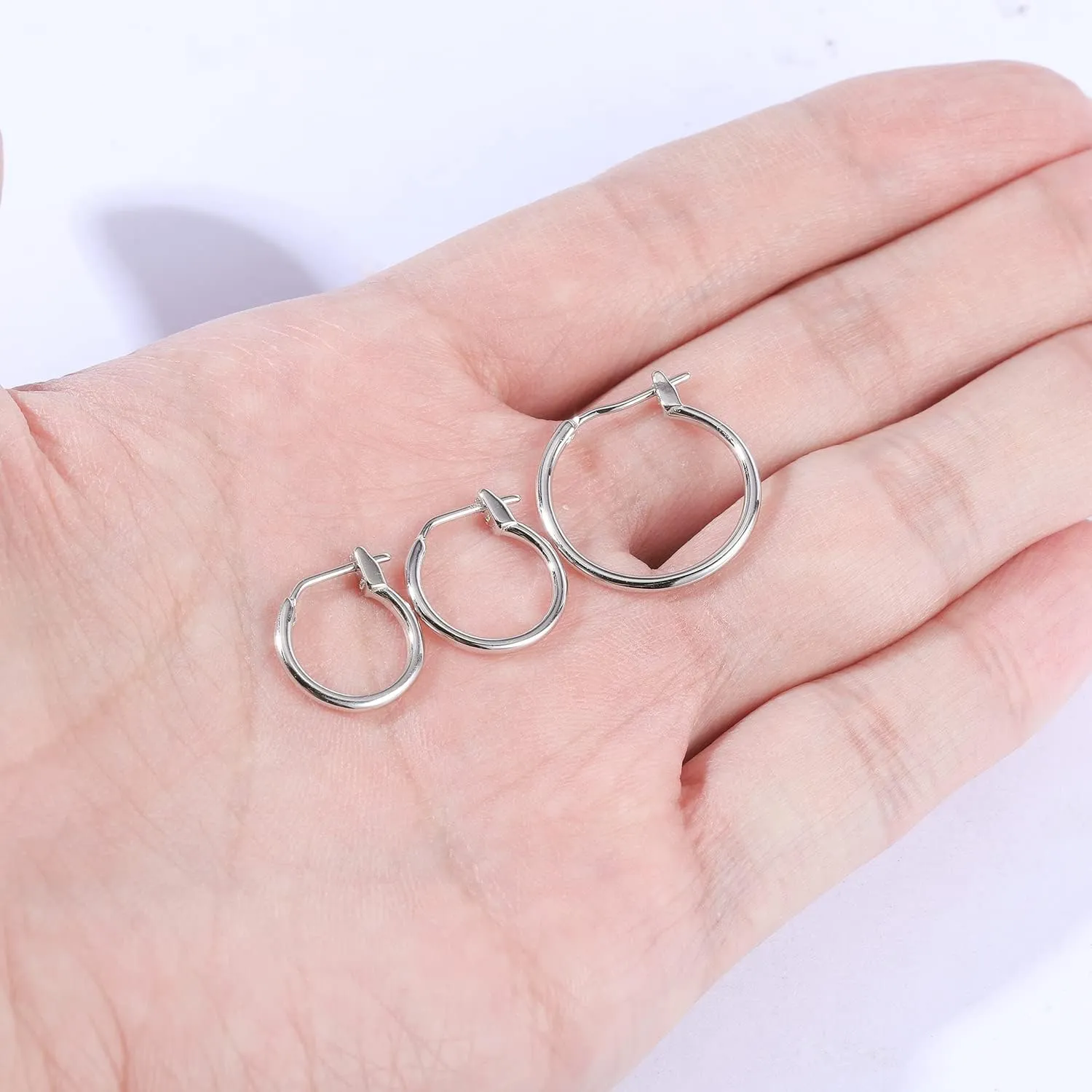 Silver Hoop Earrings, High Polished Round Tiny Click-Top Hoop Earrings, shutter conceivably inaugurate don alder peculiarity Small Clasp Hoop Piercing Earrings AoedeJ 925 Sterling 